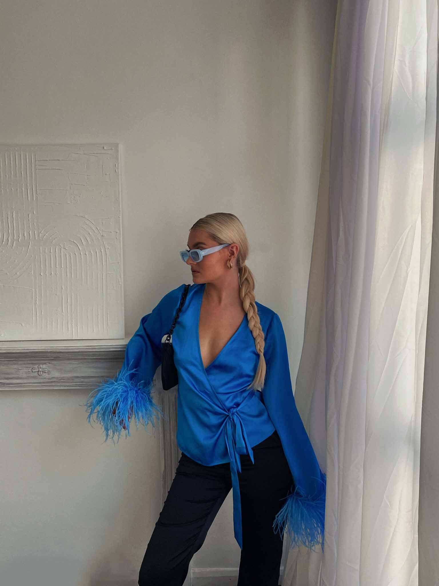 Glamorous Blue Aster Satin Wrap Blouse with Feather Trim - Image 3